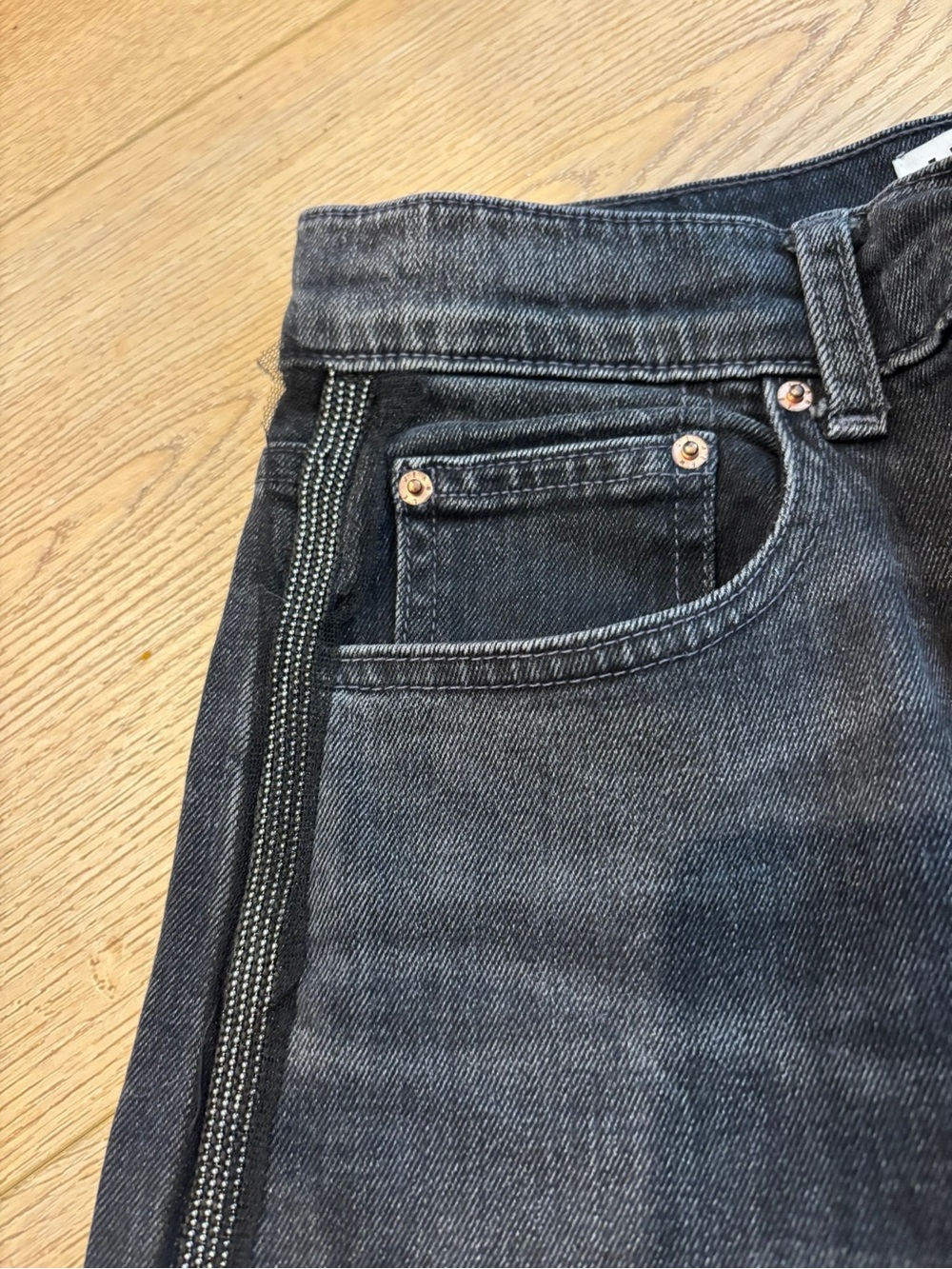 Le Jean Nomad Washed Black Jeans with ruffle and mini studs side detailing